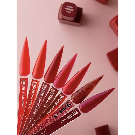 DNKa’ Cover Base Ambitious nagellak assortiment met verschillende roodtinten en glansafwerkingen