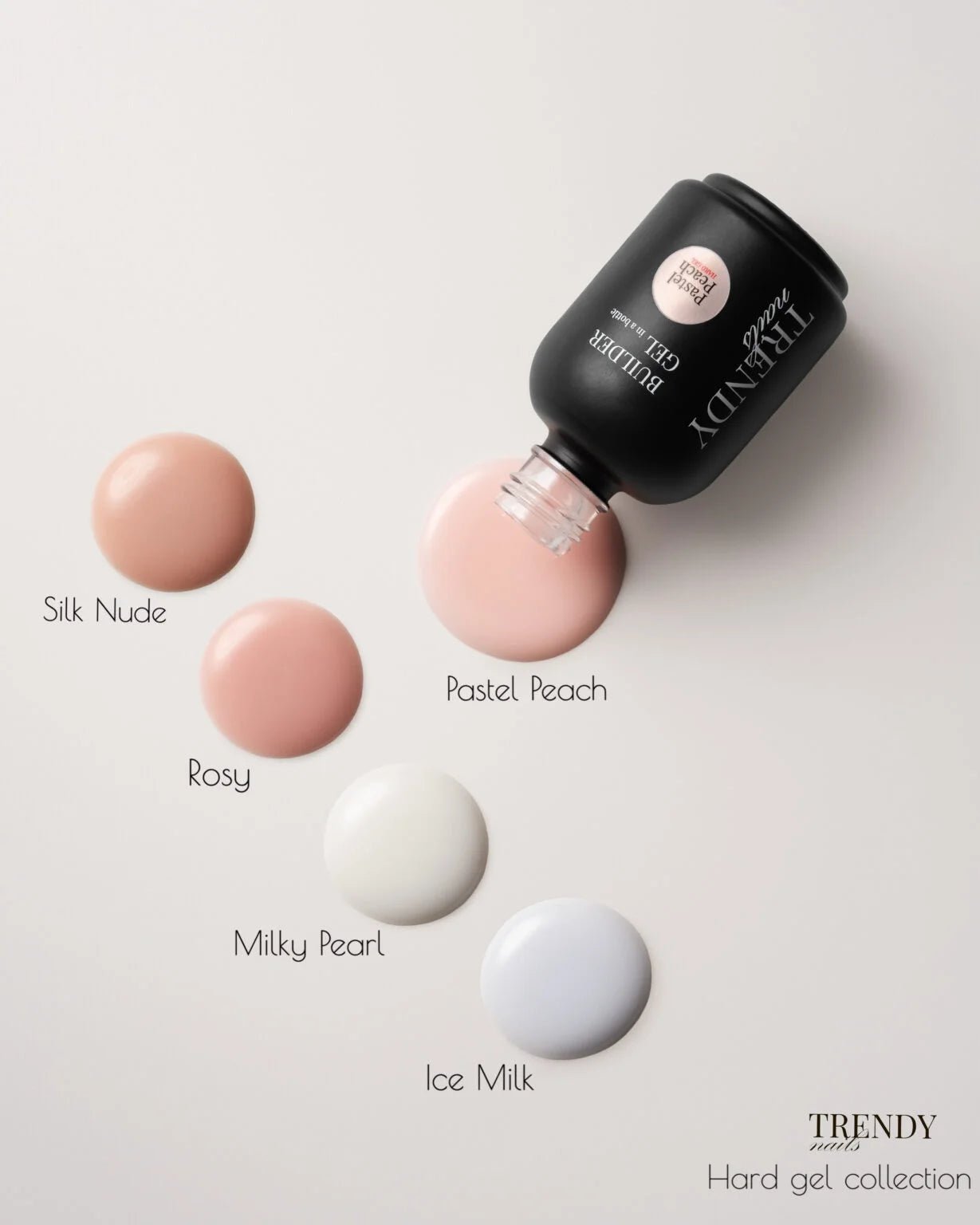 Trendy Nails Builder Gel Milky Pearl en andere gelkleuren op een tafel voor nagelstyling