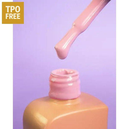 Roze nagellakflesje met druppelende kwast om professionele nagelproducten kopen te promoten