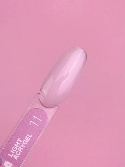LUNA Light Acrygel 13ml kopen in lichtroze kleur op een pink achtergrond voor nageldesigns